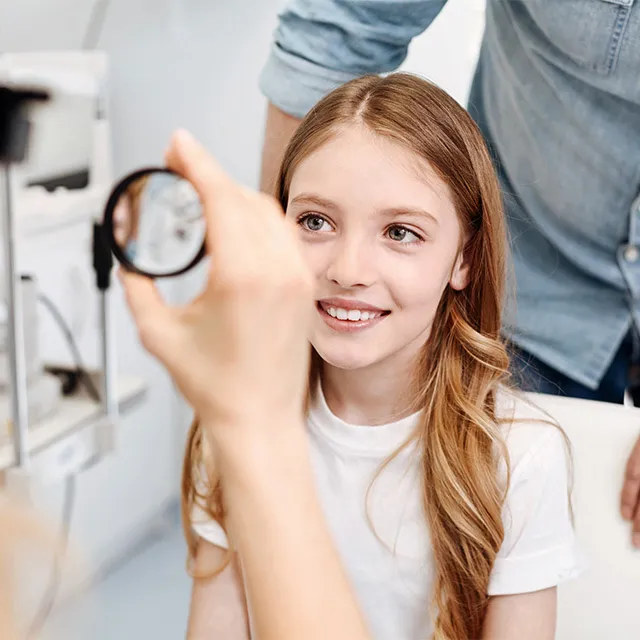 girl in eye exam